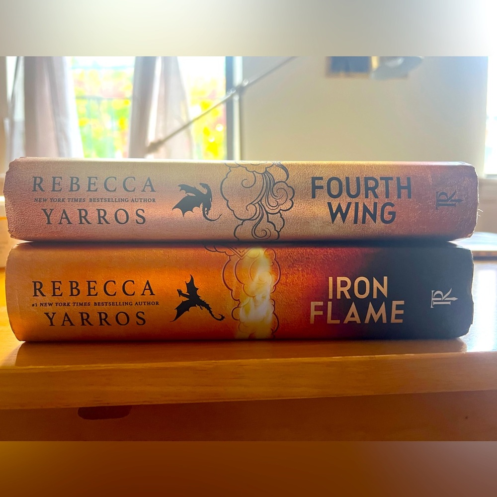 Books one and two of the The Empyrean Series-  Fourth Wing and Iron Dome